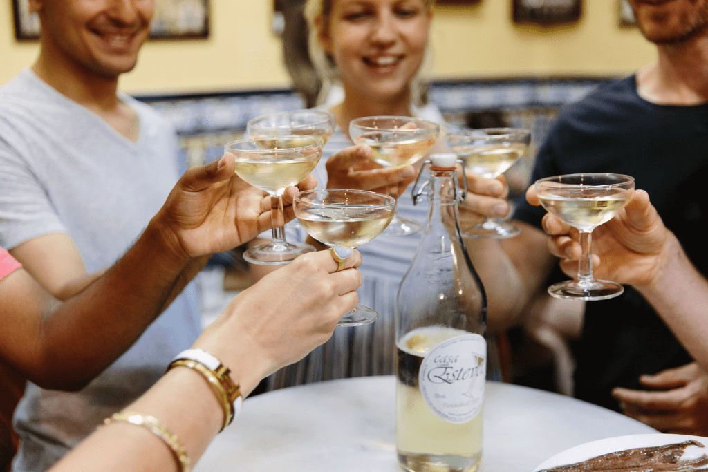 cheers with cava in barcelona, spain