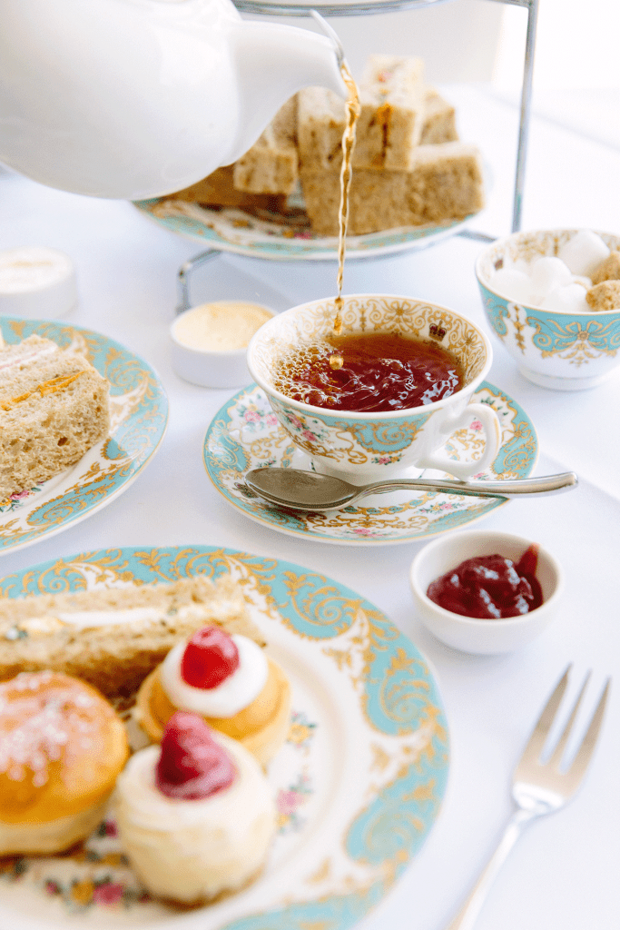 enjoying high tea in london, england