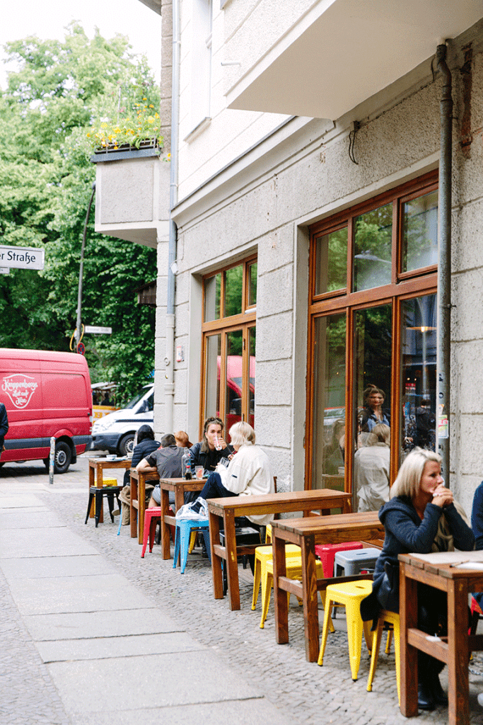 people sitting outside the terrace drinking in berlin