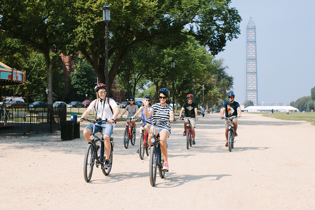 group biking on the grounds of D.C.