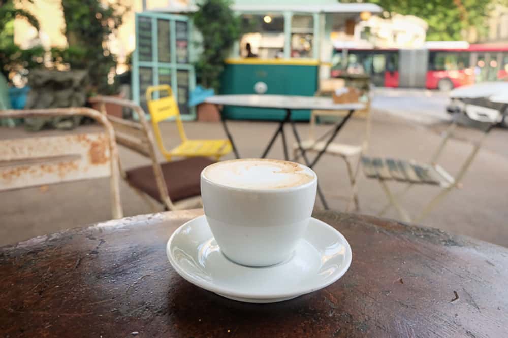 cup of coffee at tram depot in rome, italy