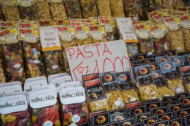 Display of bagged pasta at a food market in Rome, Italy