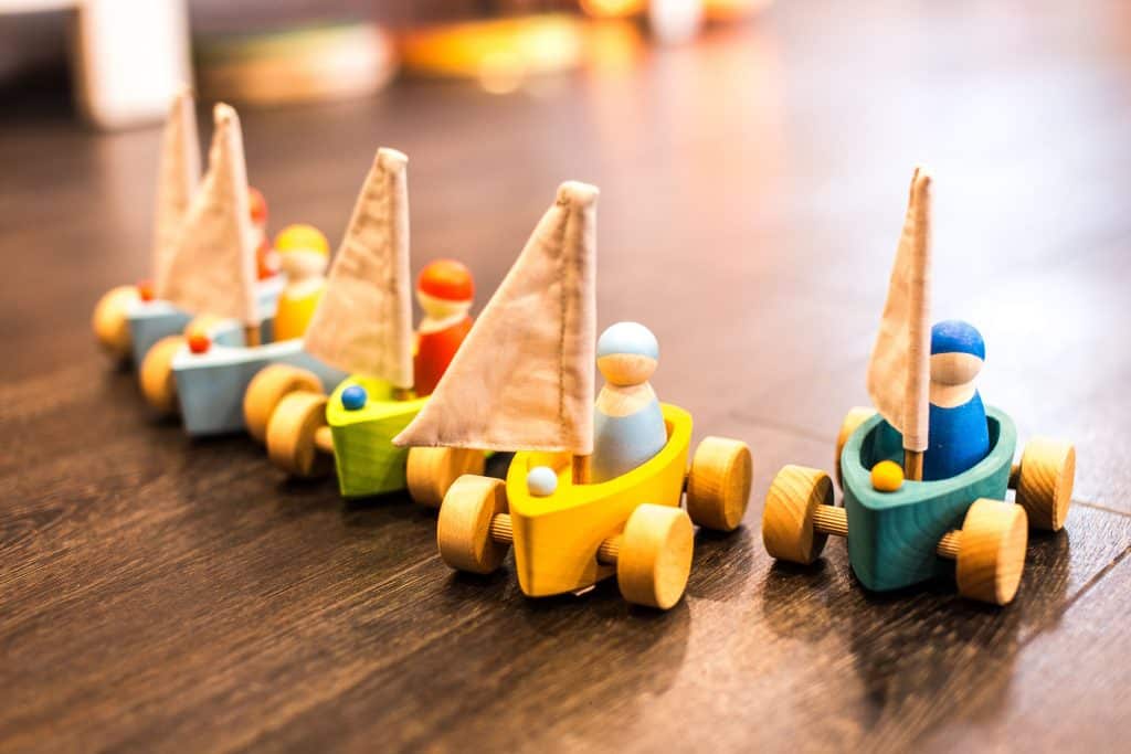 wooden sail boats with characters found at paris christmas markets