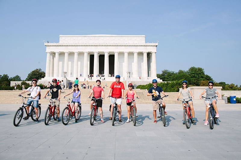 Group on bikes in front of the Lincoln Memorial