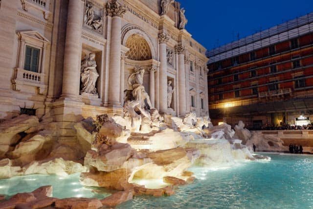 The Trevi Fountain in Rome, Italy lit up at night