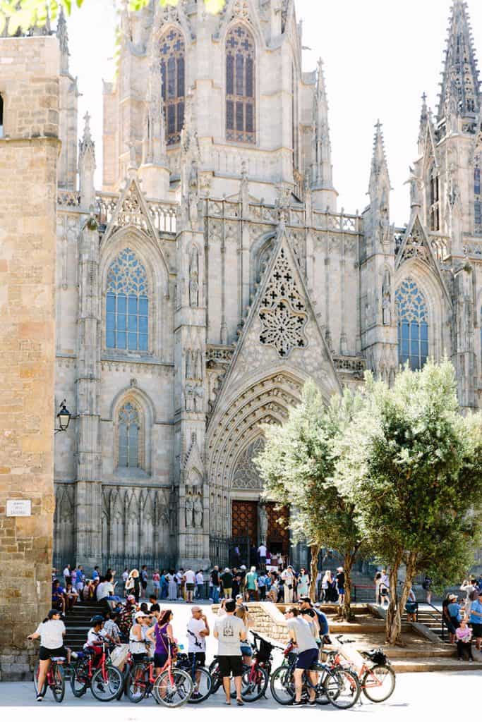 Bicycles in a group in front of the Barcelona Cathedral