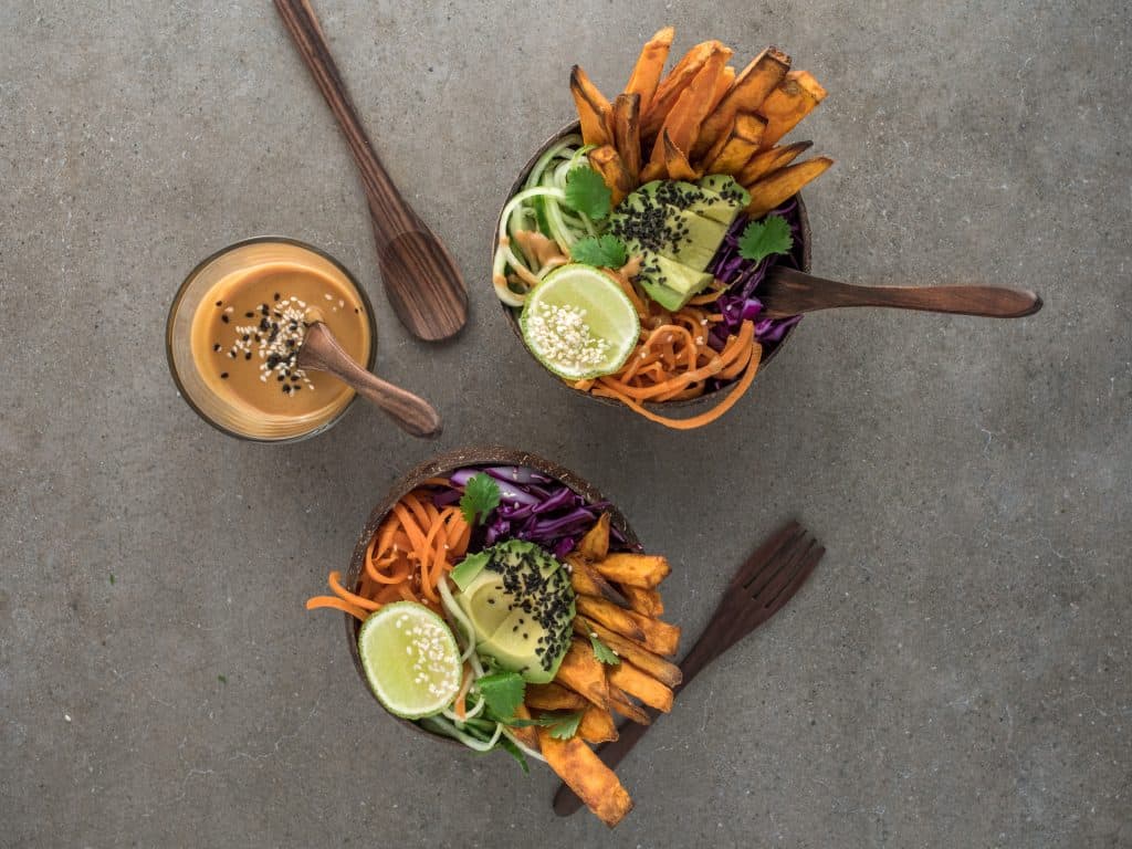vegan bowls peanut sauce avocado carrots sweet potato noodles