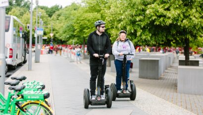 Two people ride Segways near the Memorial to the Murdered Jews of Europe in Berlin, Germany during the winter