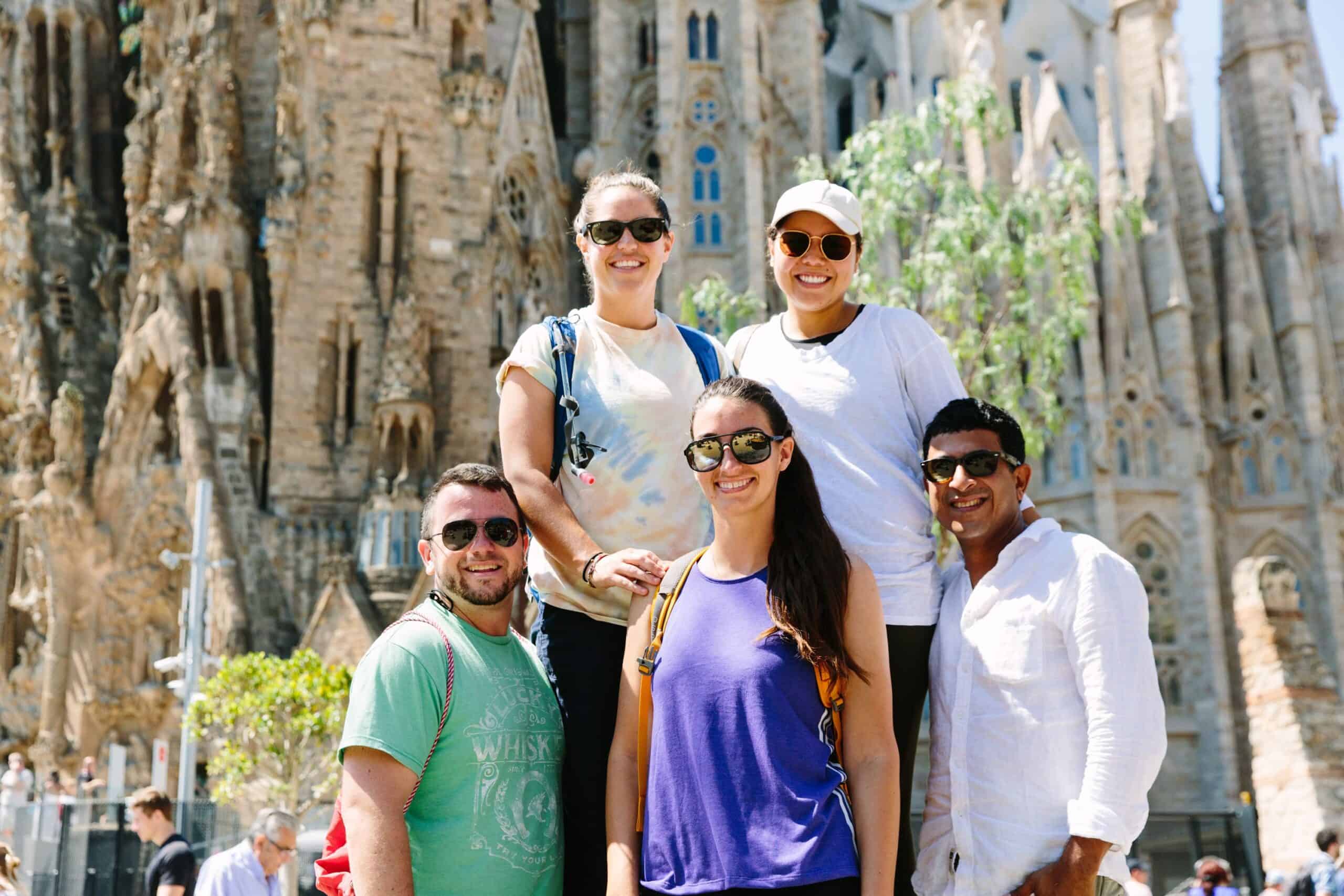 A group stands in front of the Sagrada Familia in Barcelona, Spain
