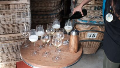 A sommelier pours glasses of Champagne in France