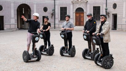 A Segway tour guide points out interesting sites in Munich, Germany