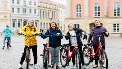 A group of women pose with their bikes in Potsdam, Germany