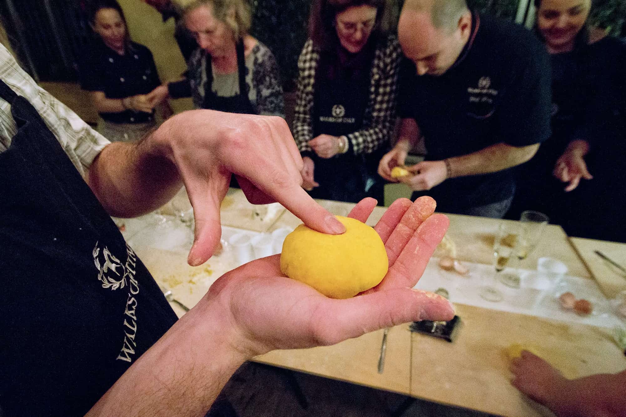 A chef shows how to test pasta dough in Rome, Italy