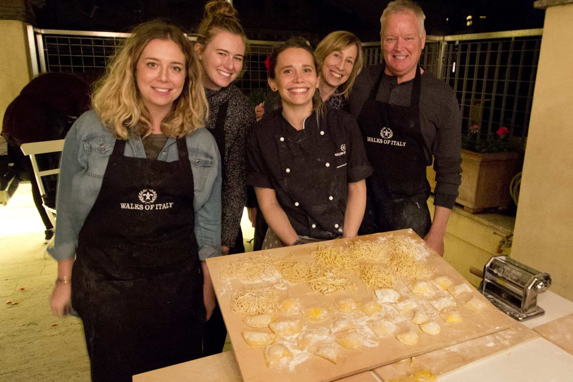 The class shows off their homemade pasta in Rome, Italy