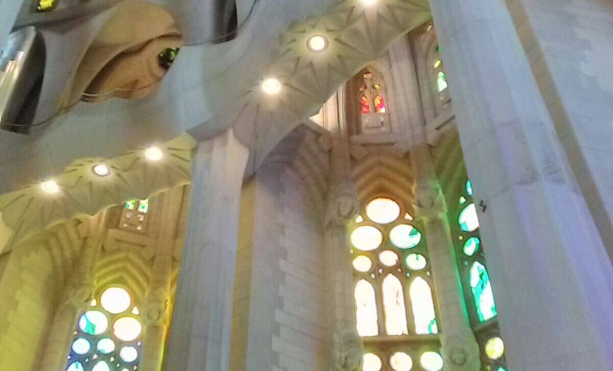 Stunning architecture and colorful lights inside the Sagrada Familia in Barcelona, Spain