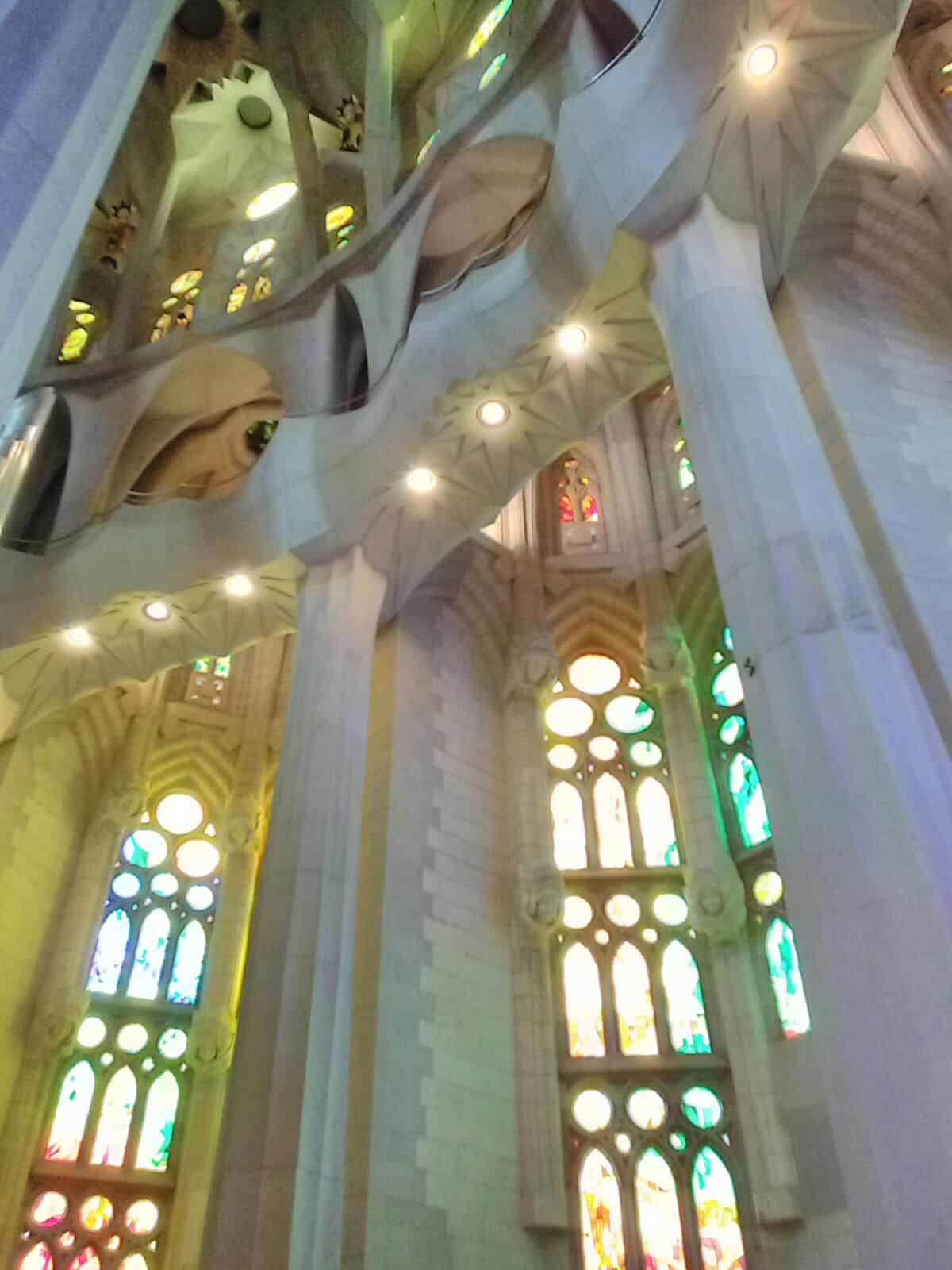 Stunning architecture and colorful lights inside the Sagrada Familia in Barcelona, Spain