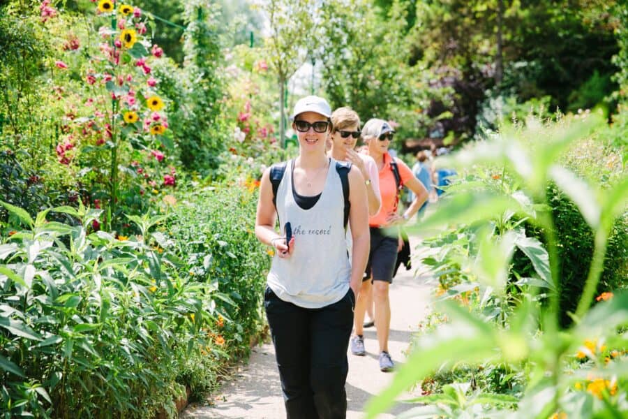 women walking through Monet's Gardens in Giverny