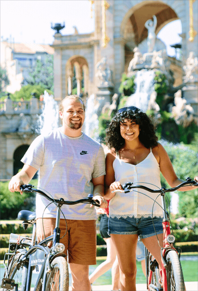 People posing with bikes in Barcelona.