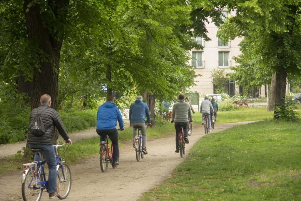 A group rides through Volkspark in Friedrichshain