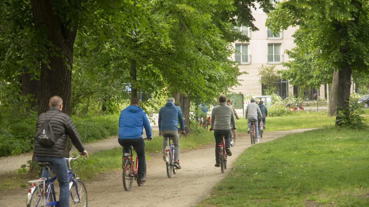 A group rides through Volkspark in Friedrichshain