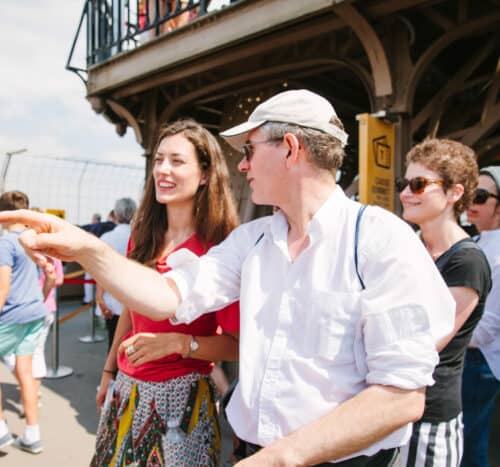 Two people talking during a tour.