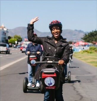 A segway tour on a road.