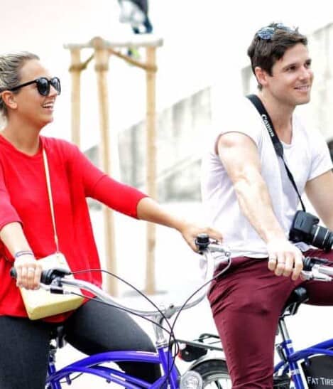 Two people on bikes in Berlin, Germany