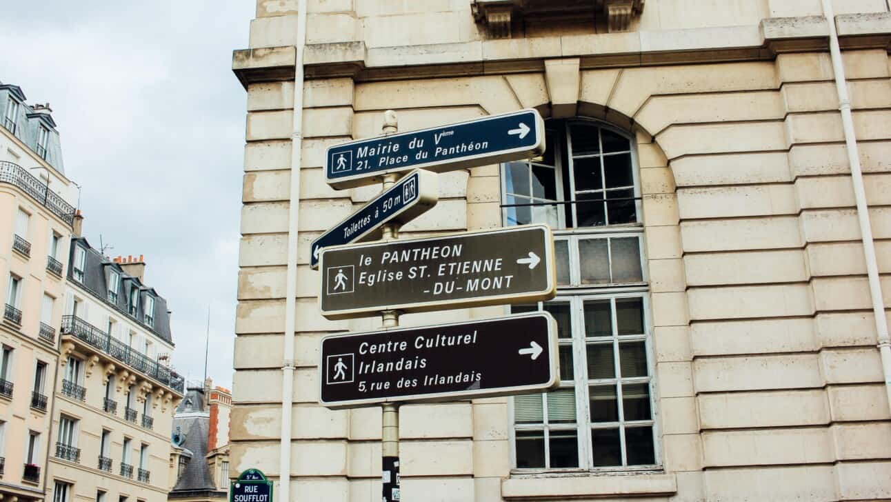 Signs pointing to various sites of interest in Paris, France