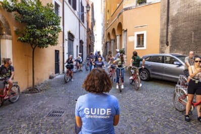 The guide gathers the group along an old Roman road