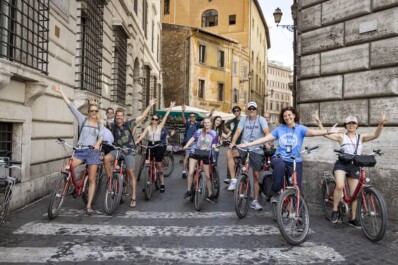 A group of cyclists poses for a photo