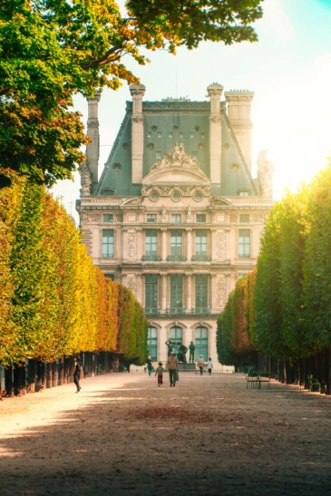 The outside of the Louvre on a sunny day