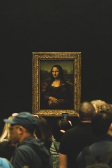 The Mona Lisa inside the Louvre Museum