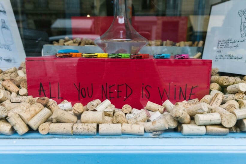 A storefront filled with wine corks