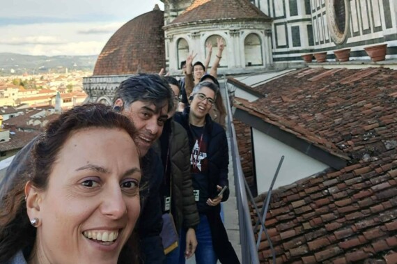A group on top of the Florence cathedral.