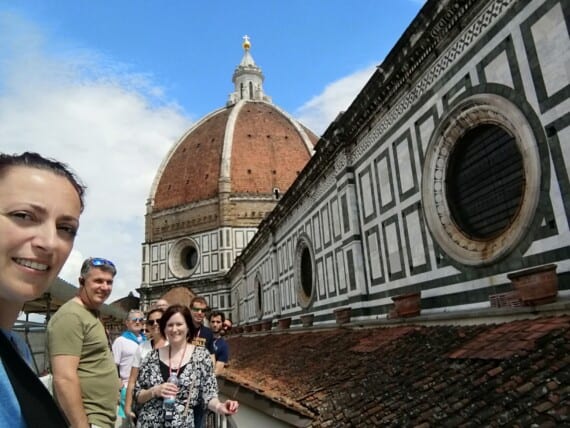 A group on top of the Florence cathedral.