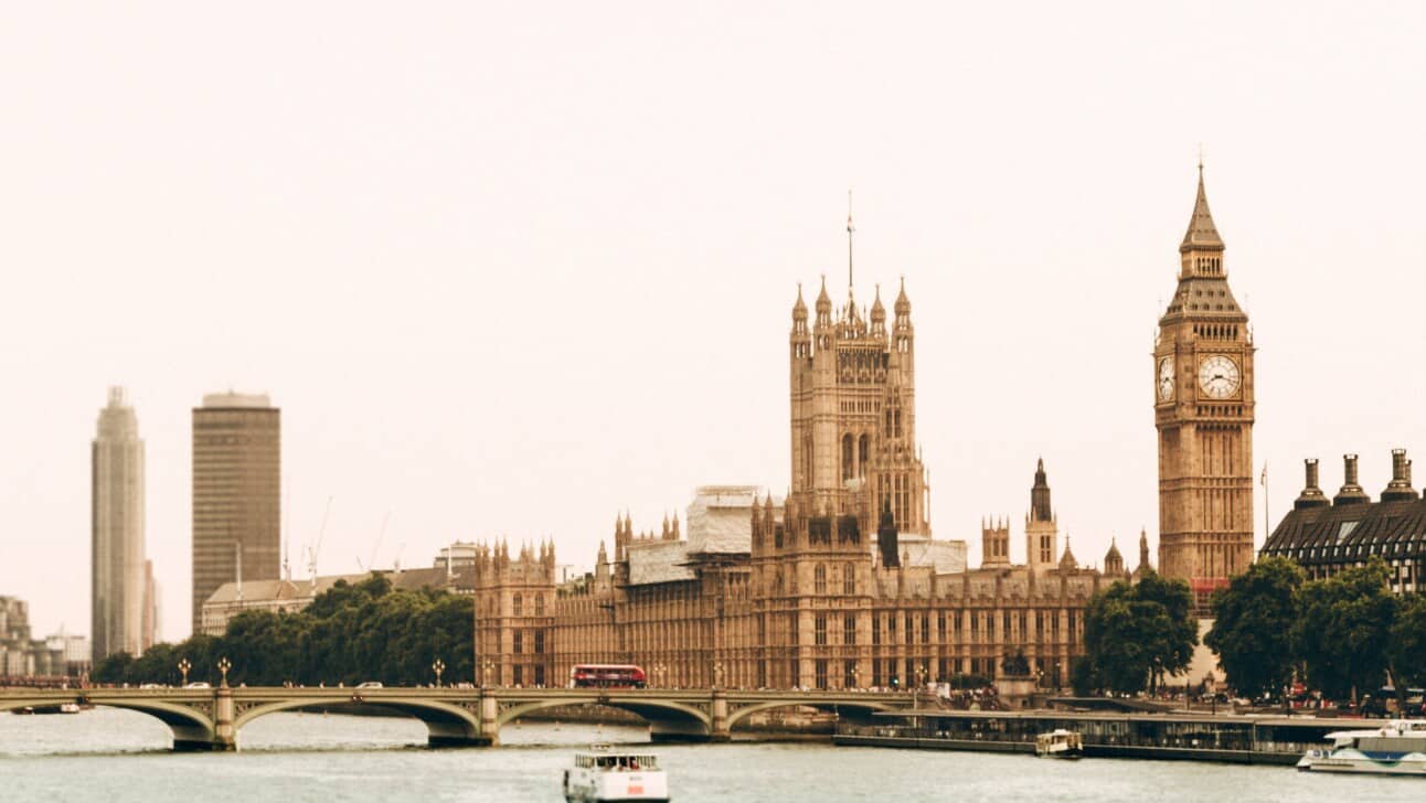 The London Houses of Parliament as seen from the Thames River