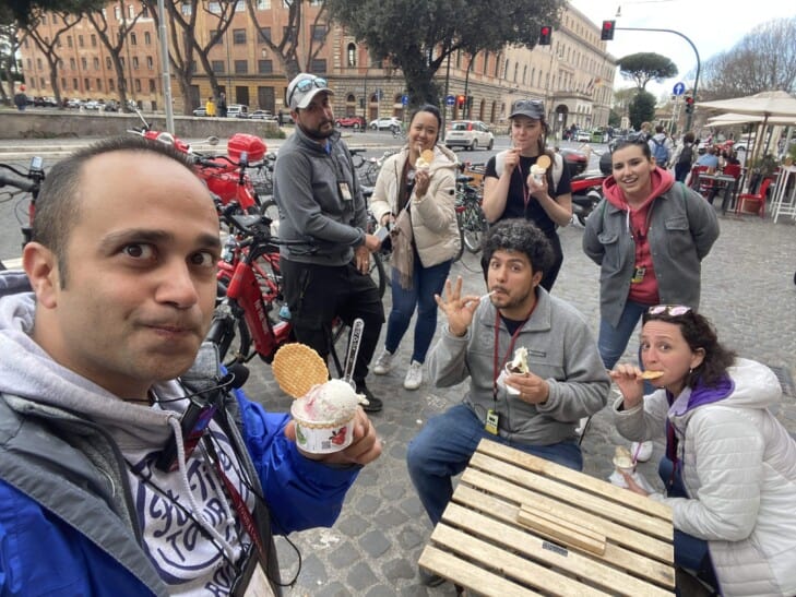 A group of friends enjoy gelato in Rome, Italy