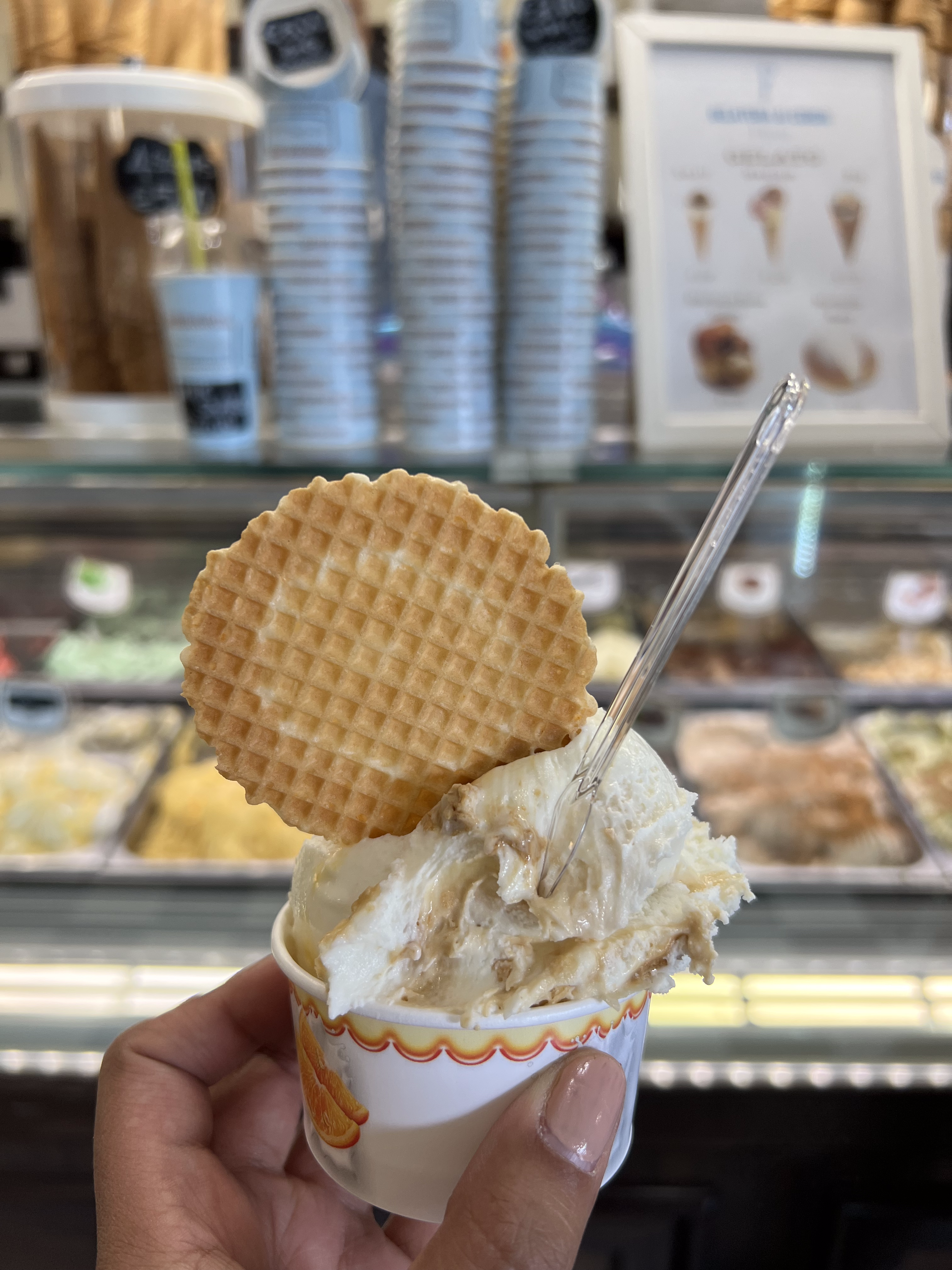 Gelato with a waffle cookie in a cup