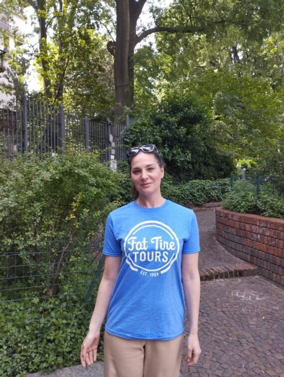 A woman in a blue t-shirt