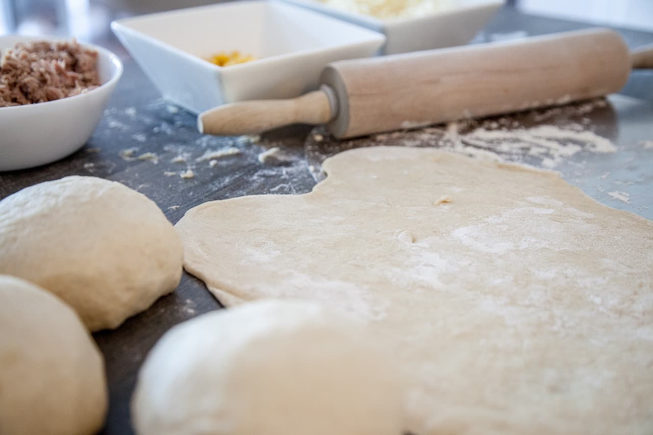 Pasta dough rolled out on a table