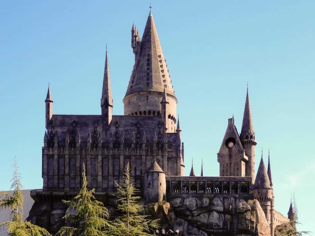 The Hogwarts Castle from the Harry Potter books and films is pictured against a blue backdrop