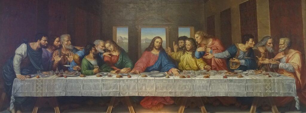 Da Vinci's "The Last Supper" painting is shown in this image with Jesus in the middle and his disciples around him