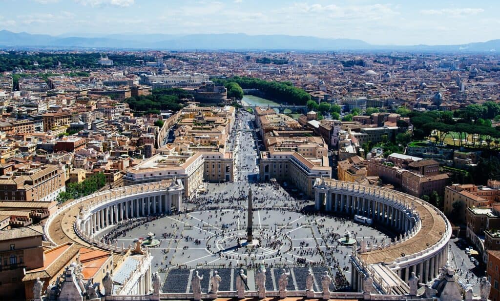 St. Peter's Square in Vatican City is pictured on a sunny day with lots of tourists in the square