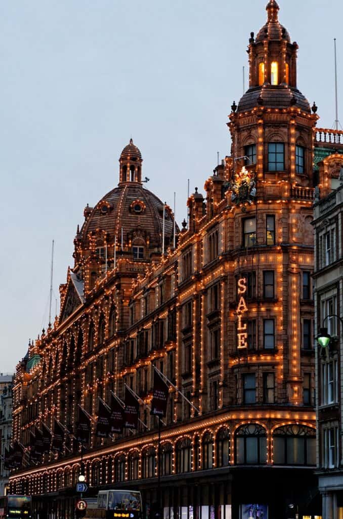 Harrods department store lit up at night