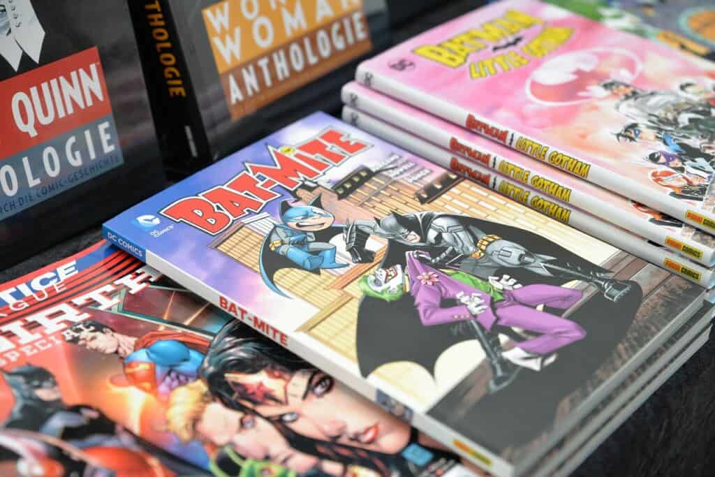 covers of comicbooks on a table