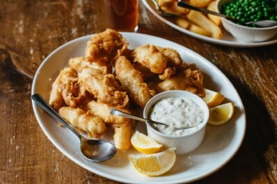 Freshly battered fish and chips in London