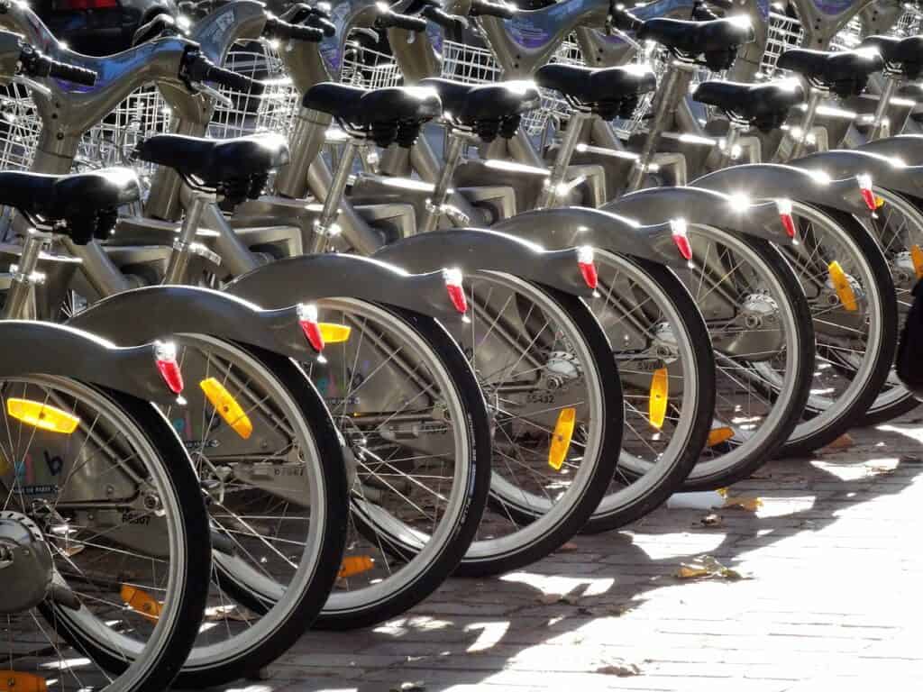 Paris velib bikes lined up in a row in a dock
