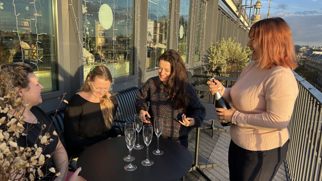 Pouring a glass of champagne in Paris