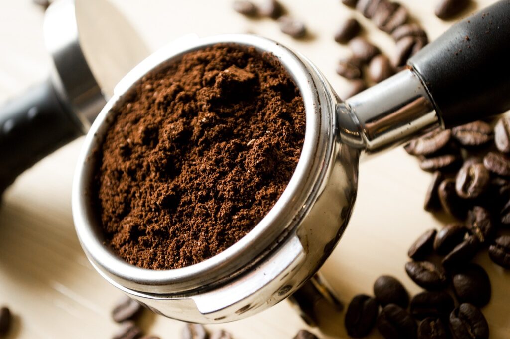 Coffee grounds pictured in espresso maker