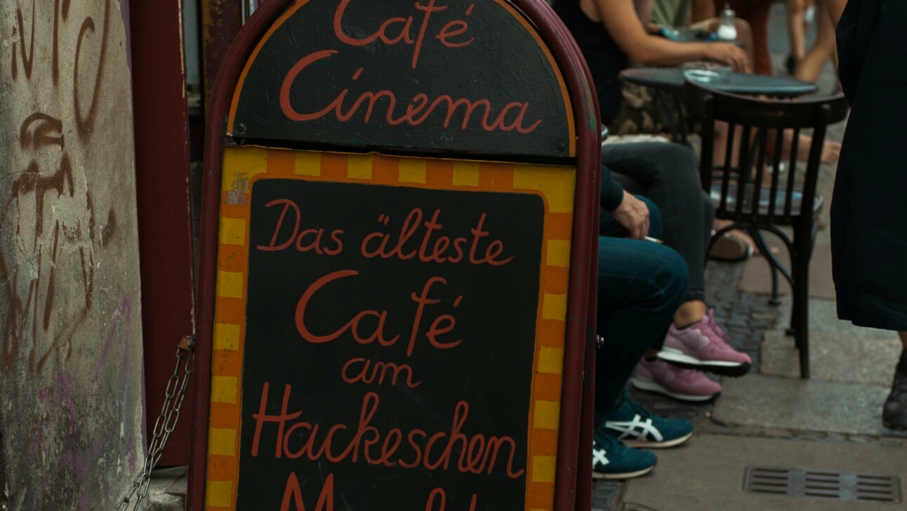A sign outside of Café Cinema in Hackescher Markt, Berlin, Germany